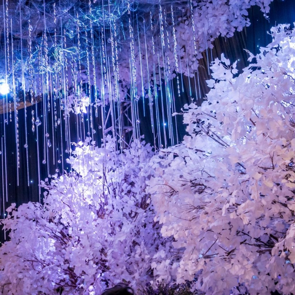 Icicles and white floral arrangements